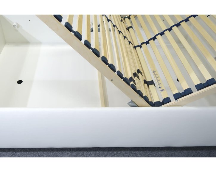 Zvýšená čalouněná postel s úložným prostorem Ryana, 140x200, bílá Zvýšená čalouněná postel s úložným prostorem Ryana, 140x200, bílá
