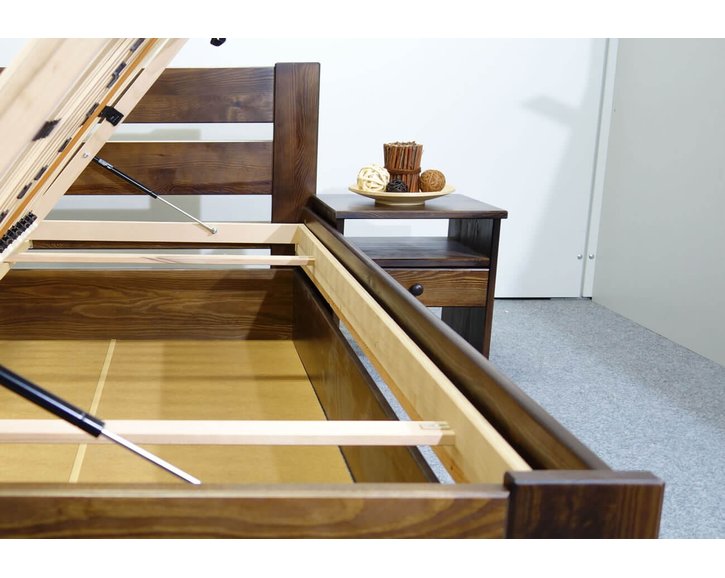 Dřevěná postel s úložným prostorem Hanka, masiv borovice, moření ořech Dřevěná postel s úložným prostorem Hanka, masiv borovice, moření ořech